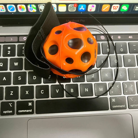 70mm Solid Wrist Elastic Holed Balls Decompression Toy - BulkBy